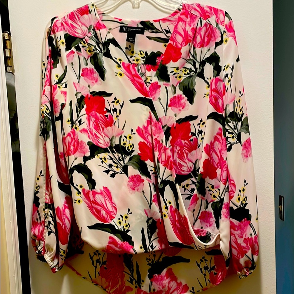 INC International Concepts Floral faux wrap blouse.